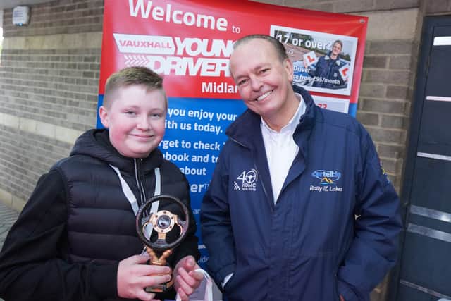   Elliot Thomas, 2021’s winner in the 10-13 age category, pictured with Quentin Willson