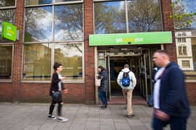 People walk near the Job Centre in Westminster.