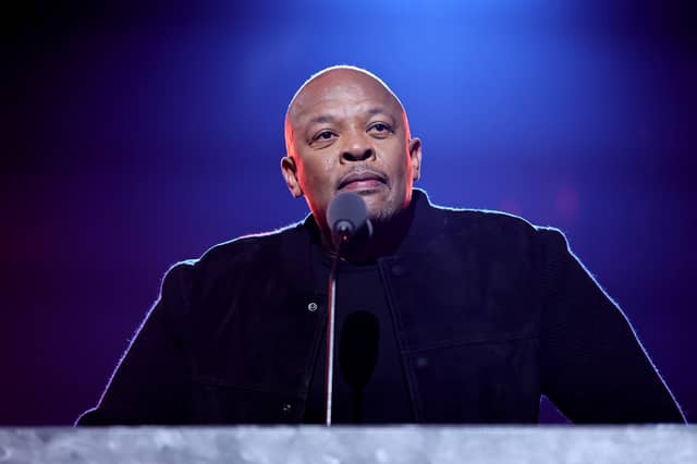 Dr. Dre introduces Inductee Eminem onstage during the 37th Annual Rock & Roll Hall of Fame Induction Ceremony at Microsoft Theater on November 05, 2022