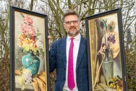 Charles Hanson, owner of Hansons Auctioners, with Queen Victoria’s paintings.  