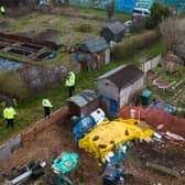 A police search team works through an allotment area as they continue to search for the missing baby in Brighton (Photo by Leon Neal/Getty Images).