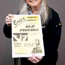 Claire Howell, music memorabilia consultant at Hansons Auctioneers, with the Sex Pistols poster.  