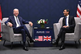 US President Joe Biden and British Prime Minister Rishi Sunak participate in a bilateral meeting during the AUKUS summit on March 13, 2023 in San Diego, California. President Biden hosts British Prime Minister Rishi Sunak and Australian Prime Minister Anthony Albanese in San Diego for an AUKUS meeting to discuss the procurement of nuclear-powered submarines under a pact between the three nations. (Photo by Leon Neal/Getty Images)