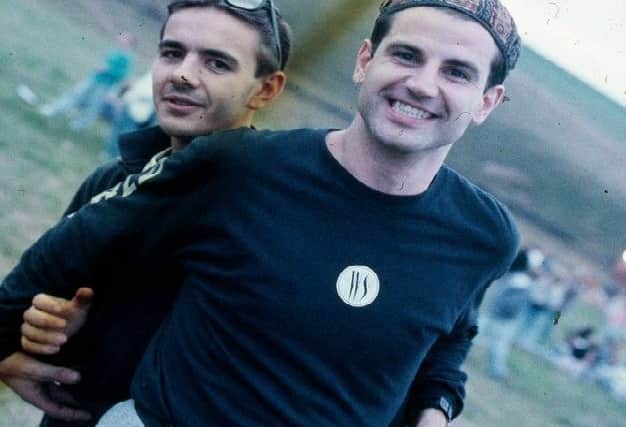 Two ravers at the first outdoor rave up North, The Gio Goi Joy Rave run by Anthony and Chris Donnelly, Ashworth Valley, Rochdale, 5th August 1989.