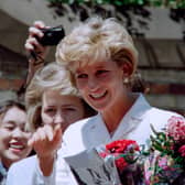 Diana, Princess of Wales, smiles as she meets wellwishers outside St Vincent's Hospice in Sydney on November 2, 1996, her last official engagement in Australia.