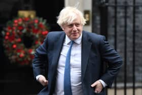 Boris Johnson has previously promised that Christmas 2021 would be ‘considerably better’ than last year's (image: AFP/Getty Images)