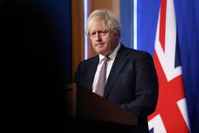 Prime Minister Boris Johnson speaks during a press conference after cases of the new Covid-19 variant were confirmed in the United Kingdom on November 27, 2021 in London, England. UK authorities confirmed today that two cases of the new Omicron Covid-19 variant, which had prompted a flurry of travel bans affecting several countries in Southern Africa, were found in the UK. (Photo by Hollie Adams/Getty Images)