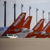 Easyjet planes are seen parked at the "Berlin Brandenburg Airport Willy Brandt" in Schoenefeld, southeast of Berlin (Photo by ODD ANDERSEN/AFP via Getty Images)

