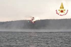 Italy's fire service posted an image of a helicopter taking part in the rescue (Image: Vigili del Fuoco)