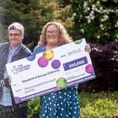 National Lottery winners Liz and George Galloway celebrate after winning Â£300,000 on the National Lottery Bingo Bonus Scratch card in Glasgow. (Photo: Anthony Devlin)