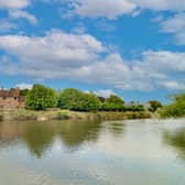 A man was arrested on suspicion of murder after a woman’s body was found in the river in Wales.