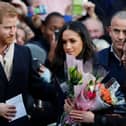 Prince Harry and his then-fiancee, now wife, US actress Meghan Markle arrive to visit the Terrence Higgins Trust World AIDS Day charity fair at Nottingham Contemporary on December 1, 2017