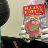 A rare first edition 1996 Bloomsbury publication of Harry Potter and the Philosopher's Stone purchased from a library for pennies is set to fetch up to £5,000 at auction. 