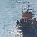 Over 50 people have been rescued after a migrant boat sunk in the Channel on Saturday morning