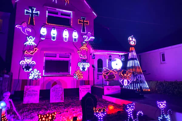 The house in Bristol is covered with around 8,000 lights to raise money for charity at Halloween