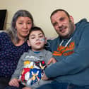 William with his mum Mihaela and dad Simon. William Howard, nine, was told by doctors his initial symptom, a twitch in his right leg, could be down to stress from playing Minecraft but in fact he has a rare and deadly disease.