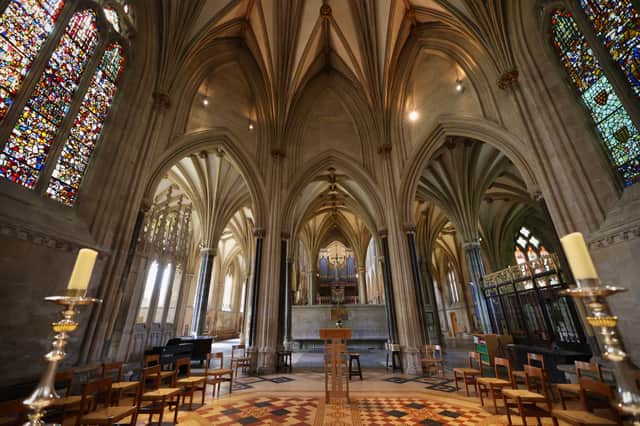 Inside Wells' Cathedral. Credit: Tobias Frank via Wikimedia Commons