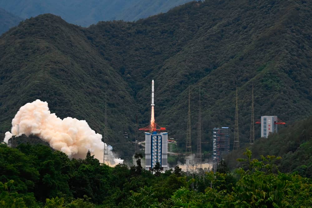 A rocket successfully lifts off from a space base in Xichang, in China's southwestern Sichuan province on June 22, 2024. (Photo by ADEK BERRY/AFP via Getty Images)
