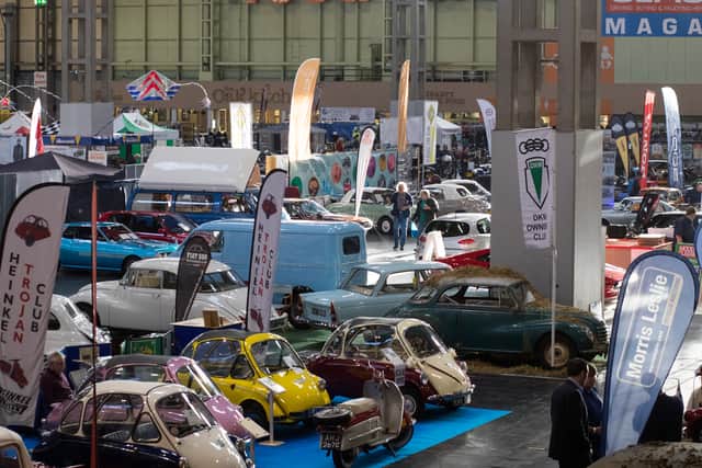 People view some of the classic cars that are being displayed on the first day of the Lancaster Classic Motor Show at the NEC Birmingham on November 10, 2017 in Birmingham, England.