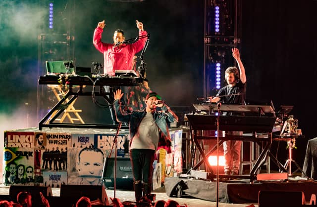HOLLYWOOD, CA - OCTOBER 27: Musicians from Linkin Park; Brad Delsen, Mike Shinoda and Joe Hahn perform during the "Linkin Park And Friends Celebrate Life In Honor Of Chester Bennington" concert at the Hollywood Bowl on October 27, 2017 in Hollywood, California.