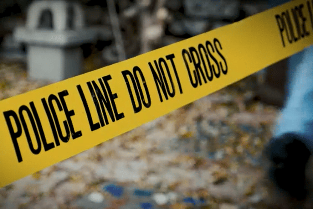 Police tape across crime scene