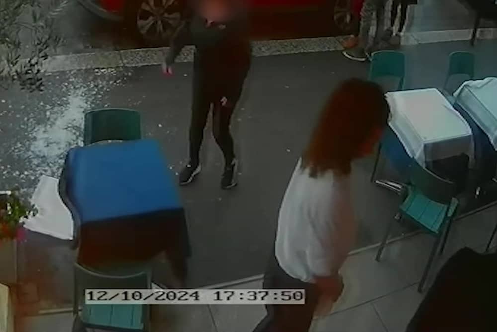 Video grab from this shocking footage shows an alleged attack on restaurant staff - in a dispute over paying a bill  at La Bella Vista in Hastings, East Sussex.