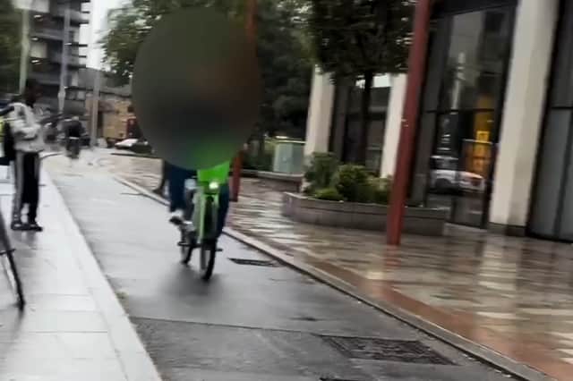 An e-bike rider crashed into a child, sending him flying.