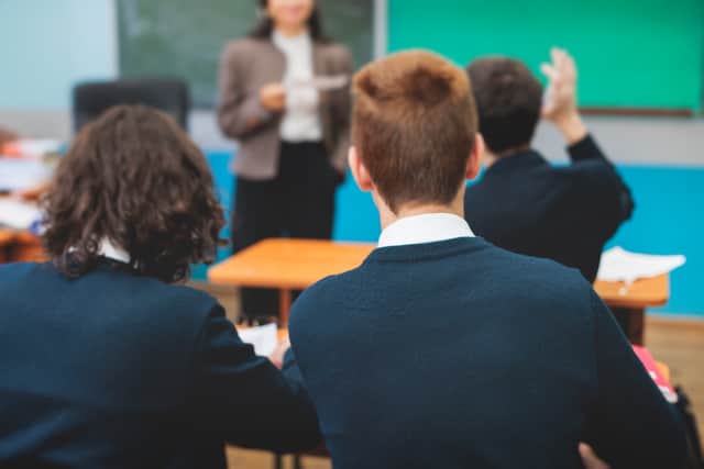 Teachers at academies and council-run schools would be on the same pay and conditions framework under the proposed bill