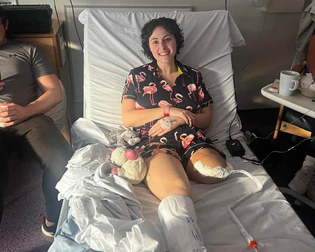 Ellie in hospital, during her treatment. A young woman feels "uplifted and free" - after having her left leg amputated due to agonising bone cancer.