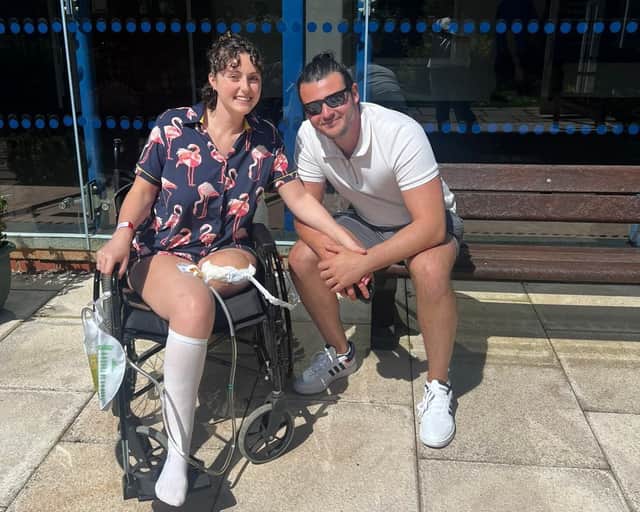 Ellie Downes, 28 and her fiancé, Max Dickinson, 29. A young woman feels "uplifted and free" - after having her left leg amputated due to agonising bone cancer.