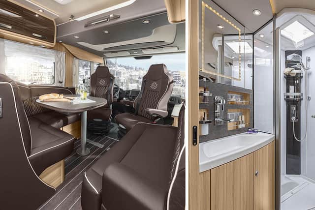 The living area has quilted leather and a drop-down bed, and the shower is huge