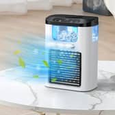 The cooling unit sprays a mist towards you, giving you relief from the heat