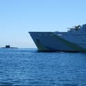 A “secret weapon” is being developed and could be used by Royal Navy technicians to search for Russian submarines. Pictured: HMS Tyne with Russian Kilo-class submarine Krasnodar in the background.
