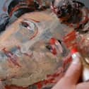 A portrait drawn with makeup by Margit van der Zwan.