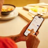 Tracking weight loss progress using the Voy app, part of a behaviour-led programme supporting Wegovy and Mounjaro users.