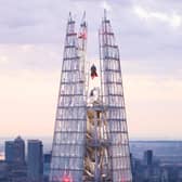 Superman soars above London in a spectacular display at the highest point of The Shard