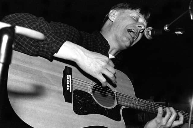 Michael Gira performing at Bowery Ballroom on February 10, 1999.