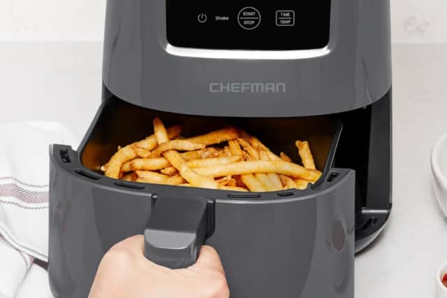 The Chefman 2L Mini Air Fryer cooking chips in its compact 2-litre basket, designed for quick meals for one or two people.