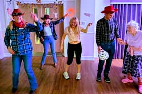 The event featured classic country hits, singalongs and energetic line dancing.