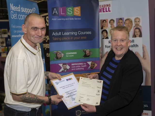 Tim Lofthouse picks up the award for the Whitby English Group from Judith Kirk