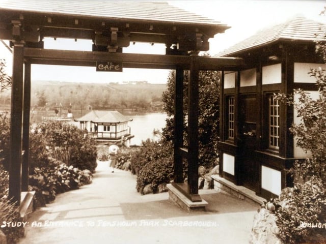 One of the entrances to the park looking down towards the boathouse.