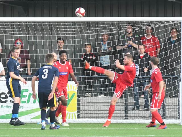 Wayne Brooksby clears the ball for Boro