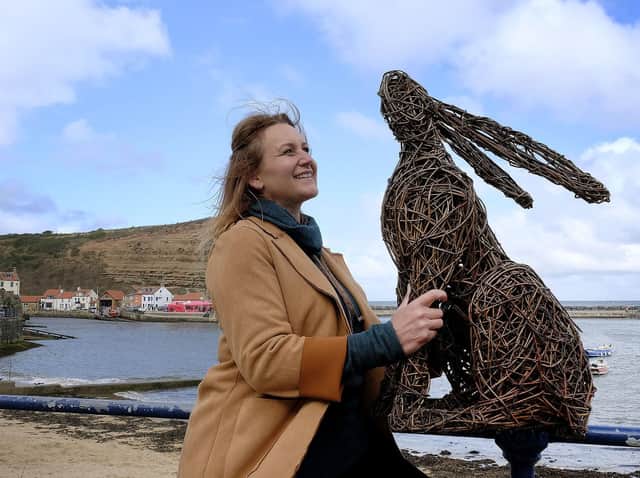 Emma Stothard with a previous sculpture. Picture by Richard Ponter