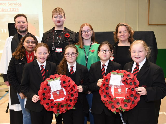 Rev Matthew Pollard along with the head teacher at Headlands School, Sarah Bone, and students who gave a reading at the service. Pictures by Paul Atkinson:
NBFP PA1946-1a