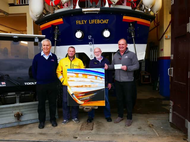 From left: David Wilson, Chair of Filey Lifeboat Station, coxswain Neil Cammish, artist Tony Dexter and hotelier James Hodgson.