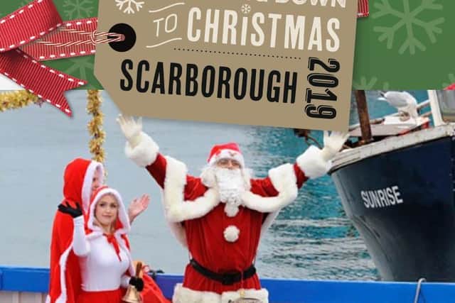 Santa arrives by boat