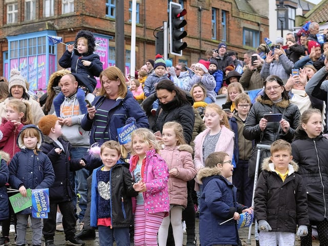 Children line up to wait for Santa's arrival.