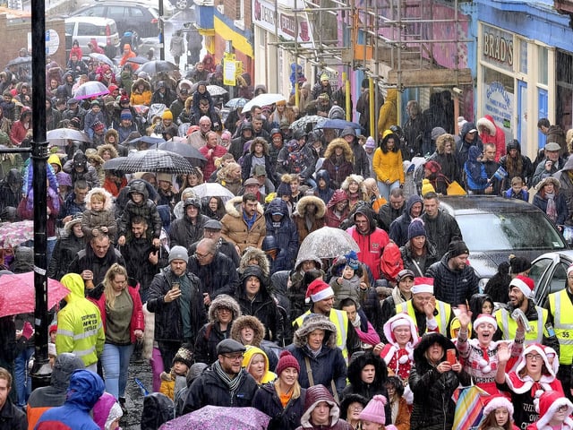 The wet weather didn't deter the masses from joining the parade.