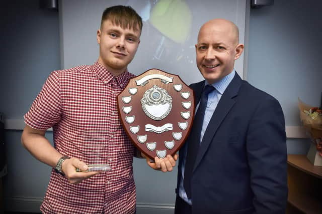 The George Traves award for Exellence winner Tyler Wilkin, presented by Andrew Hodgson. 195011a