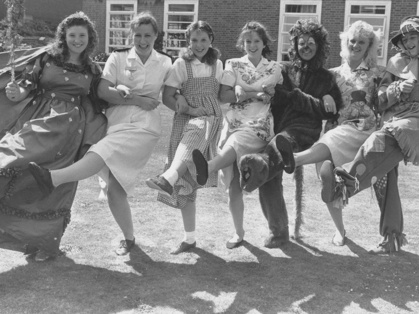 The cast of the YMCA's Wizard of Oz paid a visit to Scarborough Hospital Children's Ward in August 1990. From left, Jane Lazenby as Sorceress of the North, ward sister Helen Barrett, Stacey Morley as Dorothy, nurse auxiliary Wendy Belshaw, Joanne Porter as Lion, playworker Tracey Cleminson, David Nicholson as Scarecrow.